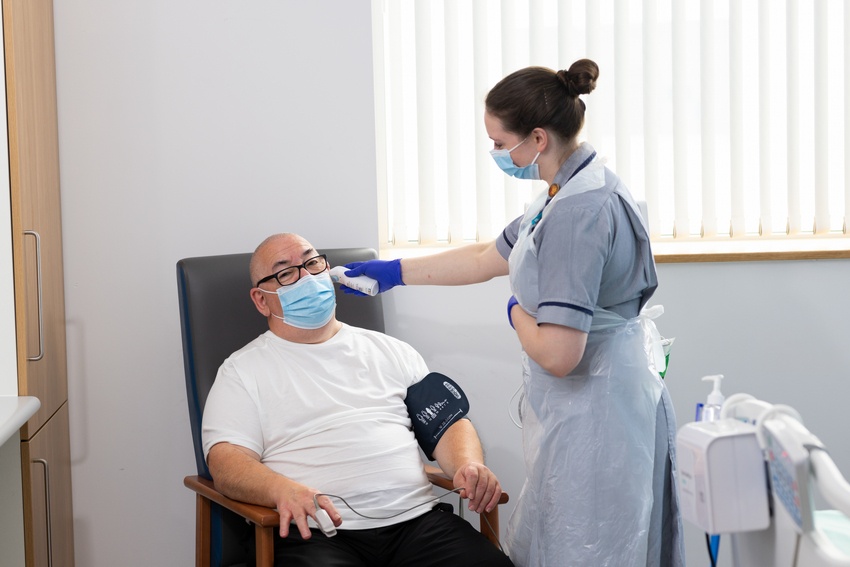 Nurse with a research patient