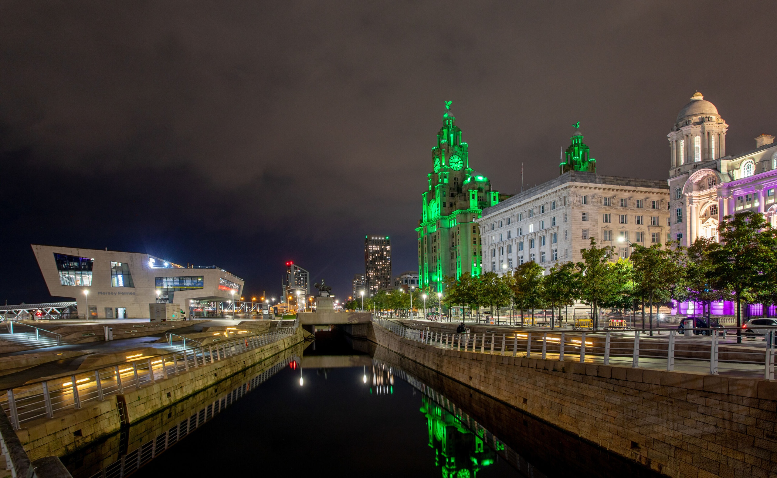 Liverpool's Pier Head lit up at night